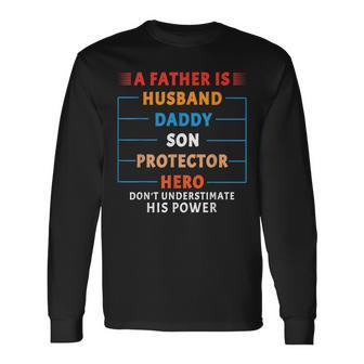 A Father Is Husband Daddy Son Protector Hero Fathers Day Long Sleeve T-Shirt T-Shirt | Mazezy