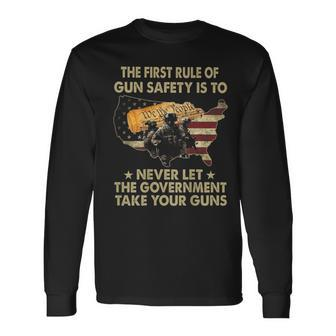 The First Rule Of Gun Safety Is To Never Let On Back Long Sleeve T-Shirt | Mazezy
