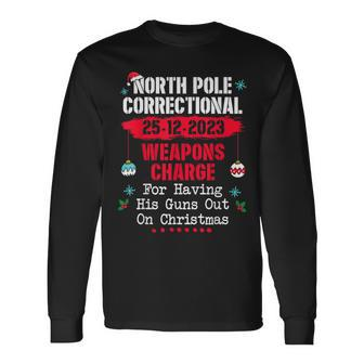 North Pole Correctional Weaponds Charge His Guns Out On Xmas Long Sleeve T-Shirt | Mazezy