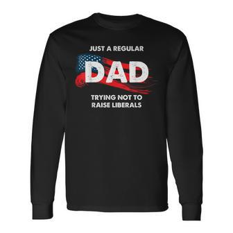Republican Just A Regular Dad Trying Not To Raise Liberals Long Sleeve T-Shirt T-Shirt | Mazezy