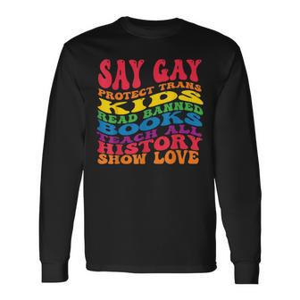Say Gay Protect Trans Read Banned Books Groovy Long Sleeve T-Shirt T-Shirt | Mazezy