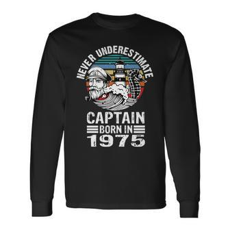Never Underestimate Captain Born In 1975 Captain Sailing Long Sleeve T-Shirt | Mazezy