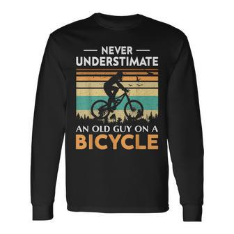 Never Underestimate An Old Guy On A Bicycle Cycling Vintage Long Sleeve T-Shirt - Seseable