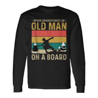 Never Underestimate An Old Man On A Snowboard Vintage Long Sleeve T-Shirt - Seseable