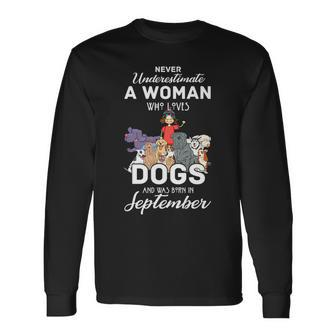 Never Underestimate A Woman Who Loves Dogs Born In September Long Sleeve T-Shirt - Seseable