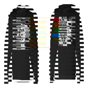 Vintage Never Underestimate The Power Of A Girl With A Book Long Sleeve T-Shirt T-Shirt | Mazezy