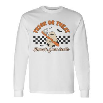Trick Or Treat Brush Your Th Ghost Halloween Dentist Long Sleeve T-Shirt - Seseable