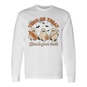 Trick Or Treat Brush Your Th Halloween Dentist Ghost Long Sleeve T-Shirt - Thegiftio UK