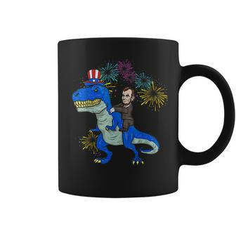 Abe Lincoln Riding A Dinosaur T Rex 4Th Of July Boys Coffee Mug | Mazezy