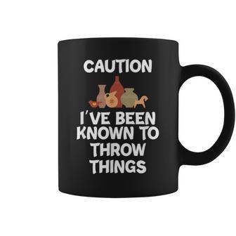 Caution I've Been Known To Throw Things Pottery Coffee Mug | Mazezy