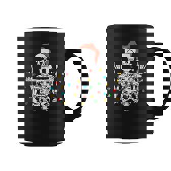 Christmas Skeleton Rocker Wrapped In Xmas Lights Santa Hat Coffee Mug - Monsterry