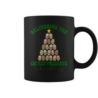 Delivering The Cutest Presents L D Nurse Christmas Tree Coffee Mug - Seseable