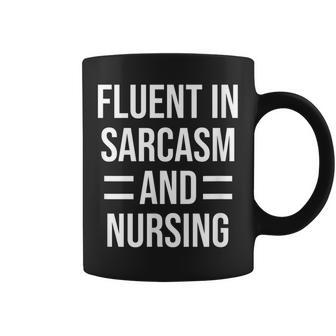 Fluent In Sarcasm And Nursing Funny Nurse Coffee Mug | Mazezy