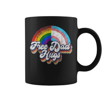 Free Dad Hugs Gay Lgbt Pride Rainbow And Transgender Month Coffee Mug | Mazezy