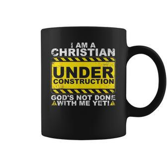 Im A Christian Under Construction Gods Not Done With Me Coffee Mug | Mazezy