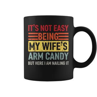 Its Not Easy Being My Wifes Arm Candy Here I Am Nailing It Coffee Mug | Mazezy