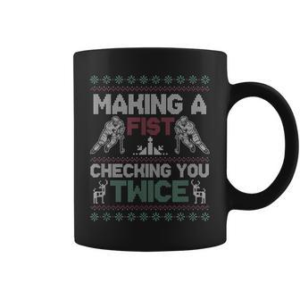 Making A Fist Checking You Twice Ugly Christmas Pajama Party Coffee Mug - Monsterry