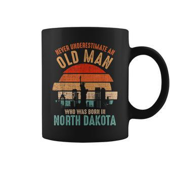 Mb Never Underestimate An Old Man Born In North Dakota Coffee Mug - Seseable