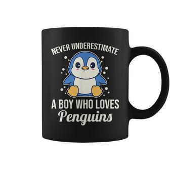 Never Underestimate A Boy Who Loved Penguins Coffee Mug - Seseable