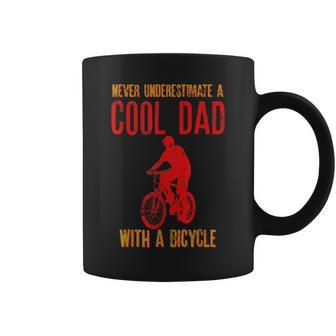 Never Underestimate A Cool Dad With A Bicycle Cool Gift Gift For Mens Coffee Mug - Seseable