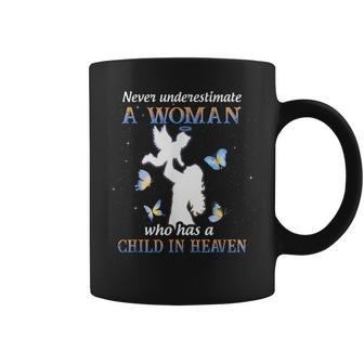 Never Underestimate A Woman Who Has A Child In Heaven Coffee Mug - Seseable
