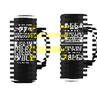 Never Underestimate A Woman With A Pickleball Paddle Pickleball Funny Gifts Coffee Mug | Mazezy