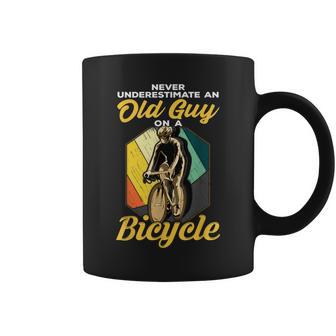 Never Underestimate An Old Guy On A Bicycle Cycling Gift For Mens Coffee Mug - Seseable