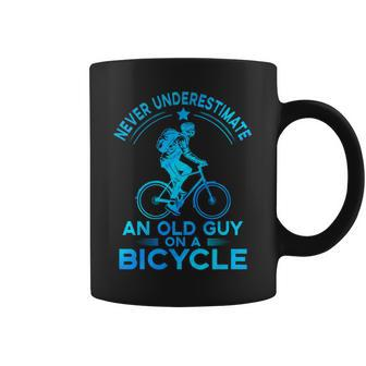 Never Underestimate An Old Guy On A Bicycle Nice Cycling Coffee Mug - Seseable