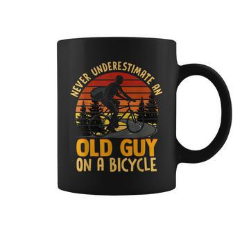 Never Underestimate An Old Guy On A Bicycle Vintage Cycling Coffee Mug - Seseable