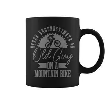 Never Underestimate An Old Guy On A Mountain Bike Funny Mtb Coffee Mug - Seseable