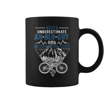 Never Underestimate An Old Guy On Mountain Bike Cycling Gift Coffee Mug - Seseable