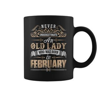 Never Underestimate An Old Lady Who Born In February Coffee Mug - Seseable