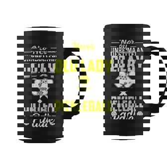 Never Underestimate An Old Lady With A Pickleball Paddle Pickleball Funny Gifts Coffee Mug | Mazezy