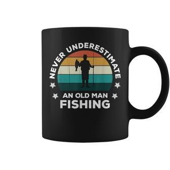 Never Underestimate An Old Man Fishing Fun Catching Fish Coffee Mug - Seseable