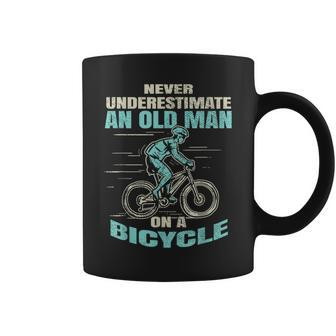 Never Underestimate An Old Man On A Bicycle Cycling Gift For Mens Coffee Mug - Seseable
