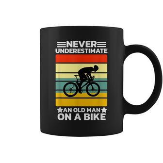 Never Underestimate An Old Man On A Bike Cycling Bicycle Men Old Man Funny Gifts Coffee Mug | Mazezy