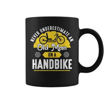 Never Underestimate An Old Man On A Handbike Handcycle Old Man Funny Gifts Coffee Mug | Mazezy