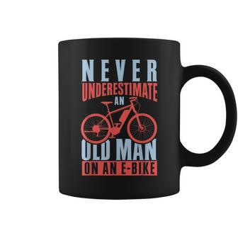 Never Underestimate An Old Man On An Ebike Old Man Funny Gifts Coffee Mug | Mazezy