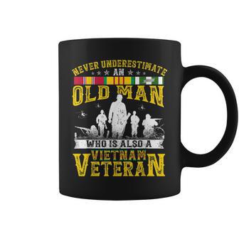 Never Underestimate An Old Man Vietnam Veteran Gift For Mens Coffee Mug - Seseable