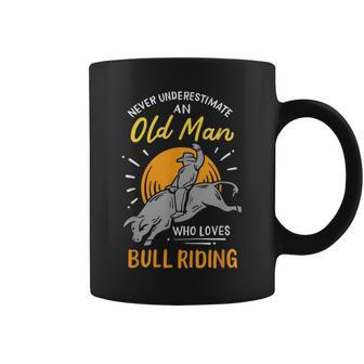 Never Underestimate An Old Man Who Loves Bull Riding Gift For Mens Coffee Mug - Seseable