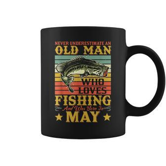 Never Underestimate An Old Man Who Loves Fishing Born In May Coffee Mug - Seseable