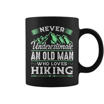 Never Underestimate An Old Man Who Loves Hiking Gift For Mens Coffee Mug - Seseable
