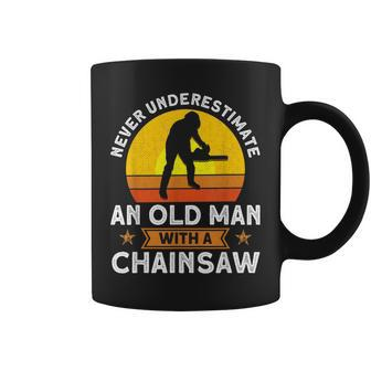 Never Underestimate An Old Man With A Chainsaw Carpenter Coffee Mug - Seseable