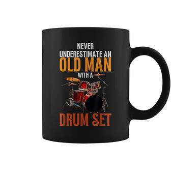 Never Underestimate An Old Man With A Drum Set Drummer Dad Old Man Funny Gifts Coffee Mug | Mazezy