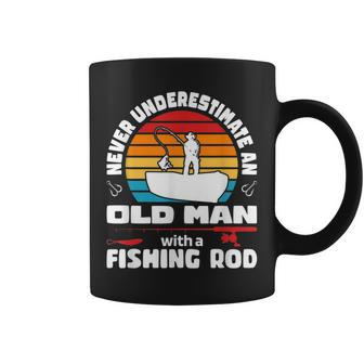 Never Underestimate An Old Man With A Fishing Rod Ice Fish Coffee Mug - Seseable