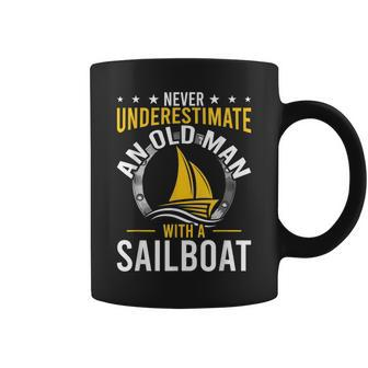 Never Underestimate An Old Man With A Sailboat Gift Old Man Funny Gifts Coffee Mug | Mazezy