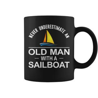 Never Underestimate An Old Man With A Sailboat Old Man Funny Gifts Coffee Mug | Mazezy