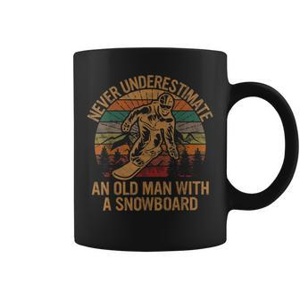Never Underestimate An Old Man With A Snowboard Snowboarding Old Man Funny Gifts Coffee Mug | Mazezy