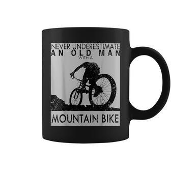 Never Underestimate An Old Mountain Biker Gift For Grandpa Coffee Mug - Seseable