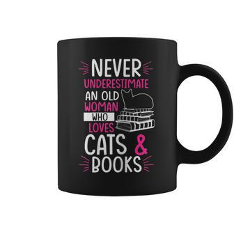 Never Underestimate An Old Woman Who Loves Cats & Books Gift Gift For Womens Coffee Mug - Seseable